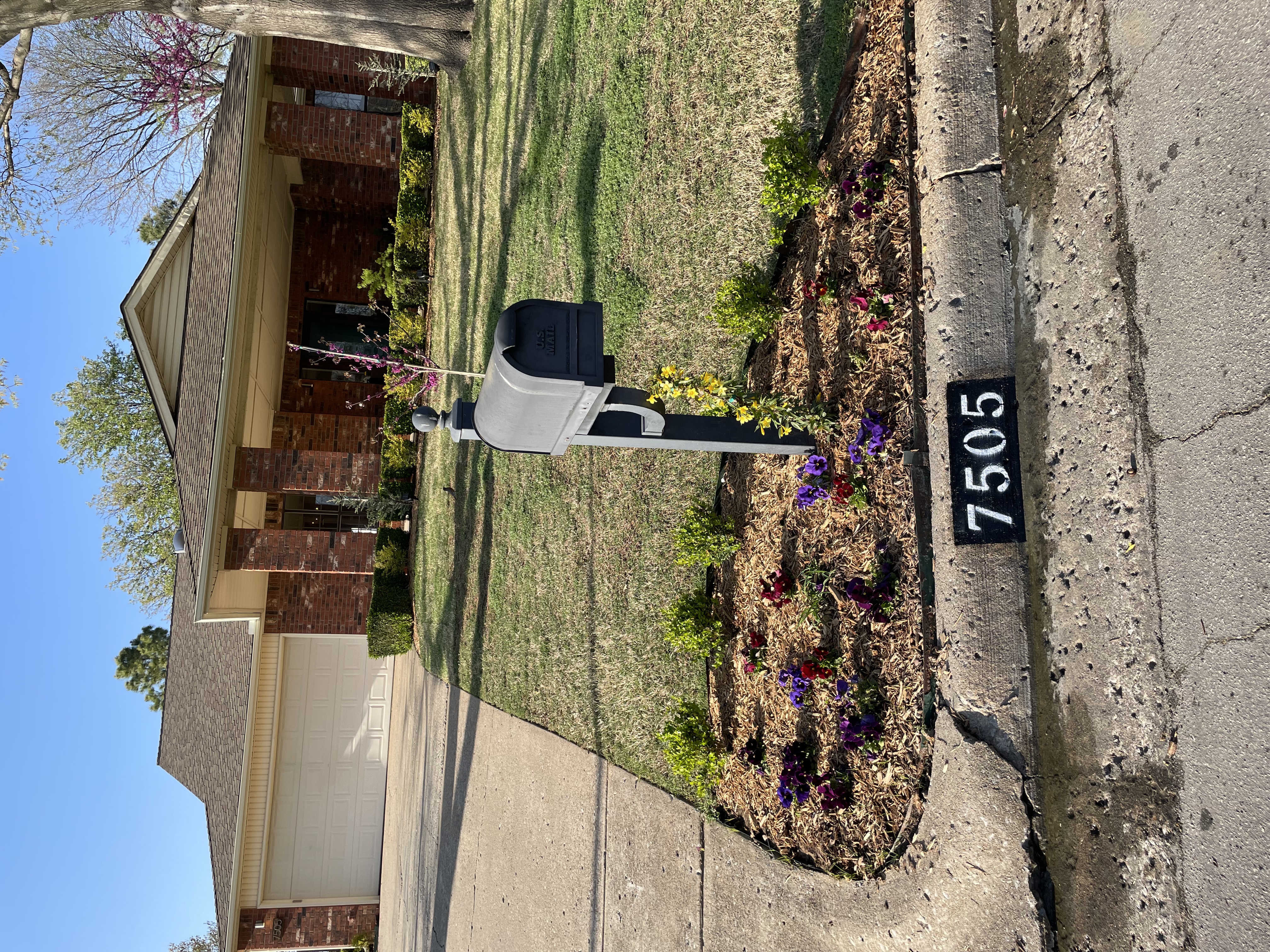 After — freshly painted curb address number by Okie Curb Paint