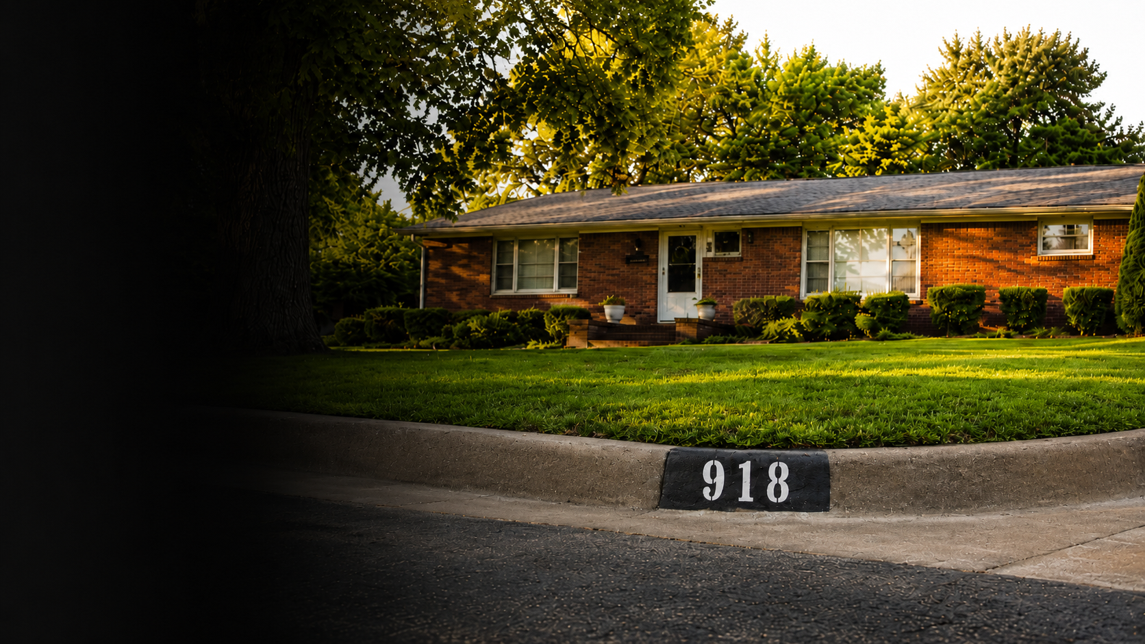 918 curb address number painted in Tulsa Oklahoma